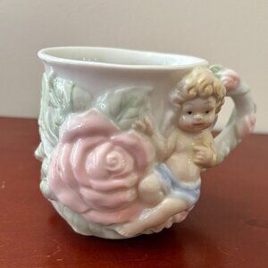 Avon Angel Rose Tea
Cup Cherub Embossed Porcelain Mug Flowers
Baby Cherub Blonde